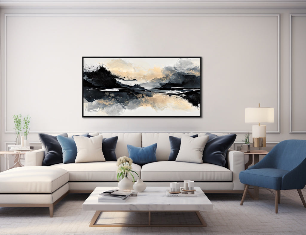 A large abstract black and gold art print.