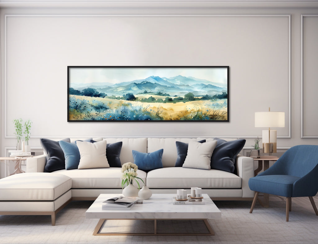 A framed landscape canvas art featuring a field of wild flowers in the backdrop of mountains.