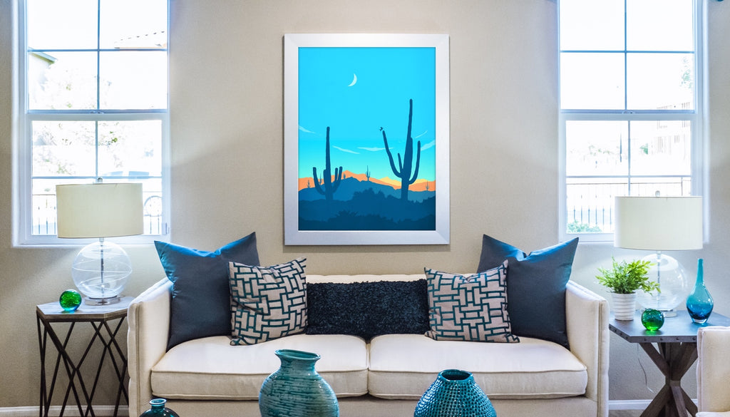 Saguaro cacti greet the morning sun in this crisp minimalist artwork.