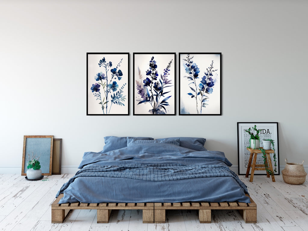 A set of three minimalist floral prints in indigo blue.