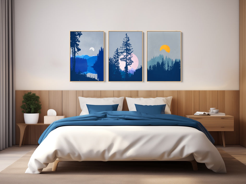 A set of three moonlit forest landscape art prints in blue and gray. 