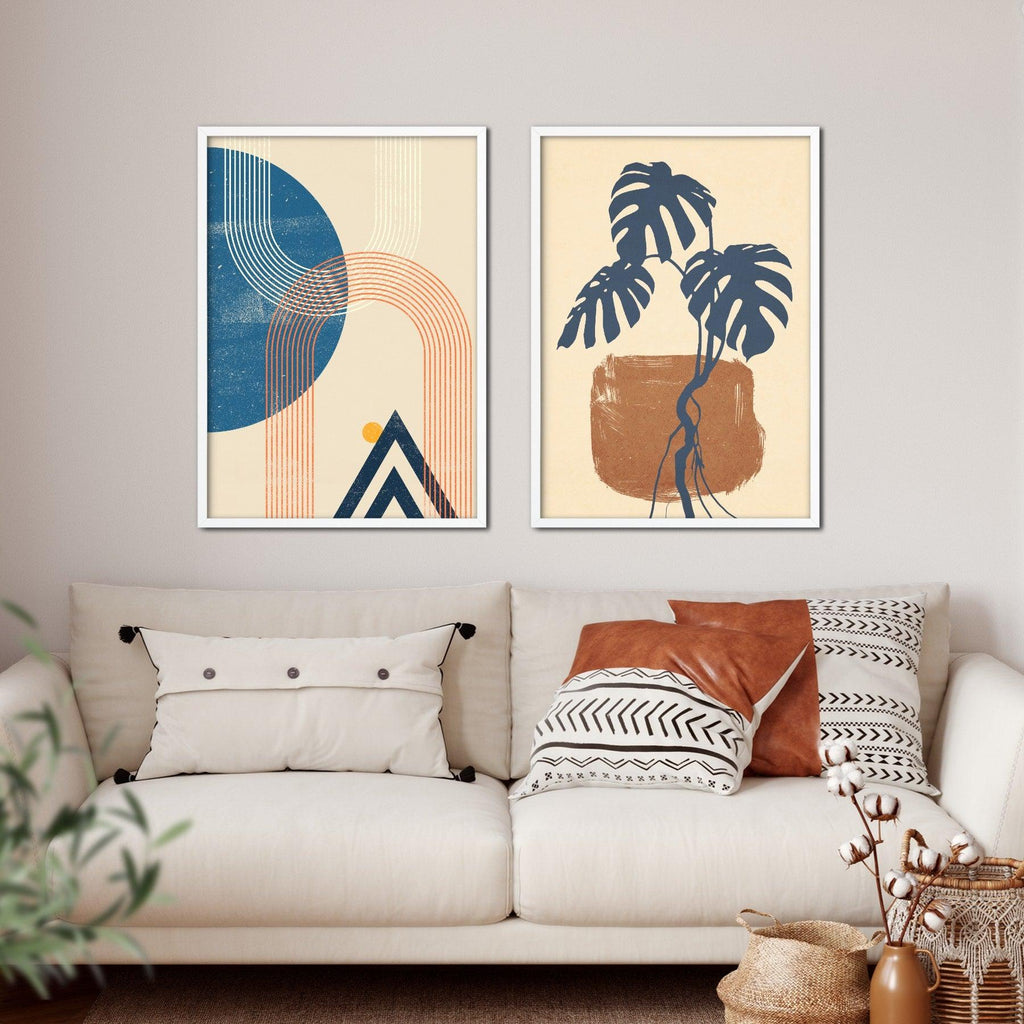 A set of two boho abstract art prints featuring a geometric print and a botanical print.